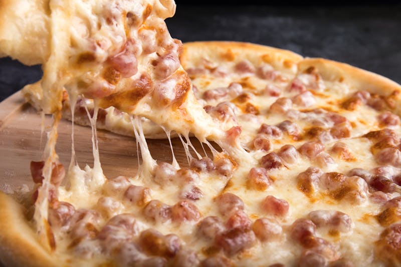 Imos classic cheese pizza with Provel cheese on thin crust